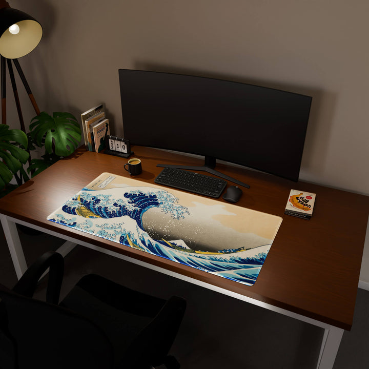 Full desktop view featuring a generously sized 120x57CM-47x22.4in desk mat with the Great Wave of Kanagawa design. Its ample dimensions cater to both demanding gaming and professional tasks, ensuring consistent performance and a neat workspace.