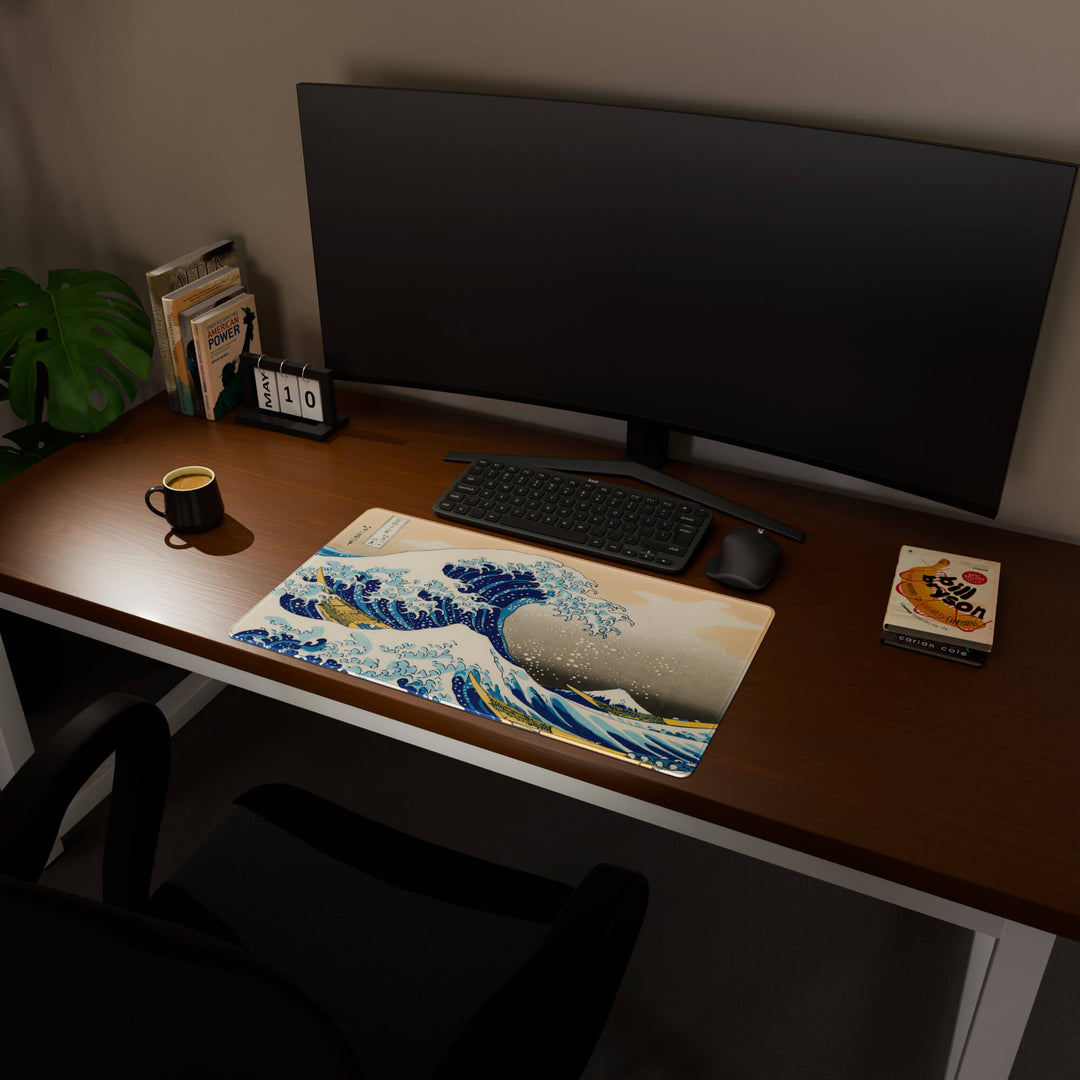 Full desktop view featuring a deep 70x40CM-27.5x15.7in desk mat with the Great Wave of Kanagawa design. The increased depth offers more wrist and arm support, enhancing comfort during prolonged computer use and protecting the desk below.