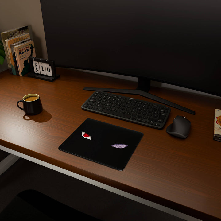 Full desktop view featuring a compact 29x25CM-11.4x9.8in mousepad with 'Dōjutsu' design, inspired by minimalist anime ninja eyes. This space-saving mousepad offers a comfortable and smooth area for essential mouse movement, ideal for small or minimalist desks.