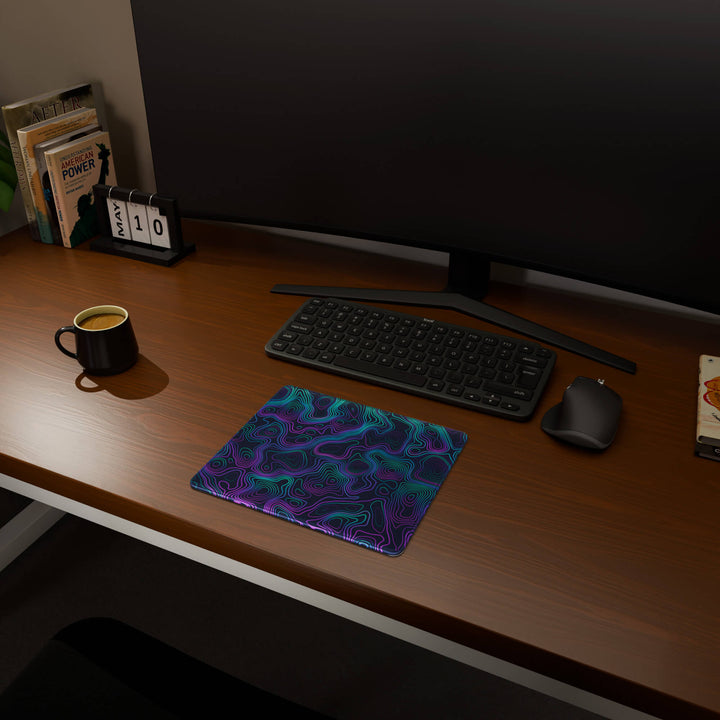 Full desktop view featuring a compact 29x25CM-11.4x9.8in mousepad with 'Neon Topographic' design, inspired by vibrant neon topographic art. This space-saving mousepad offers a comfortable and smooth area for essential mouse movement, ideal for small or minimalist desks.