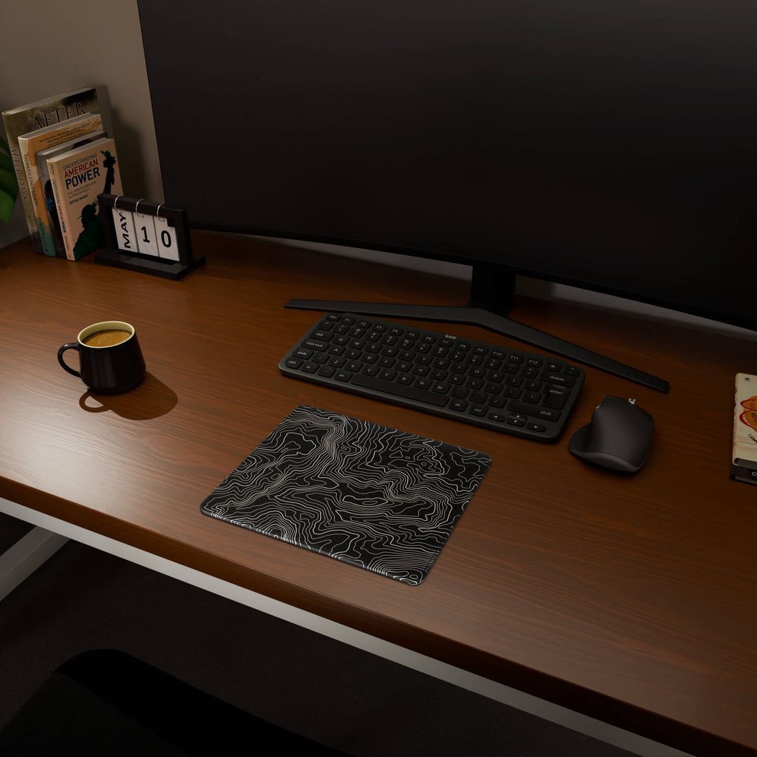 Full desktop view featuring a compact 29x25CM-11.4x9.8in mousepad with 'Classic Topographic' design, inspired by minimalist topographic line art. This space-saving mousepad offers a comfortable and smooth area for essential mouse movement, ideal for small or minimalist desks.
