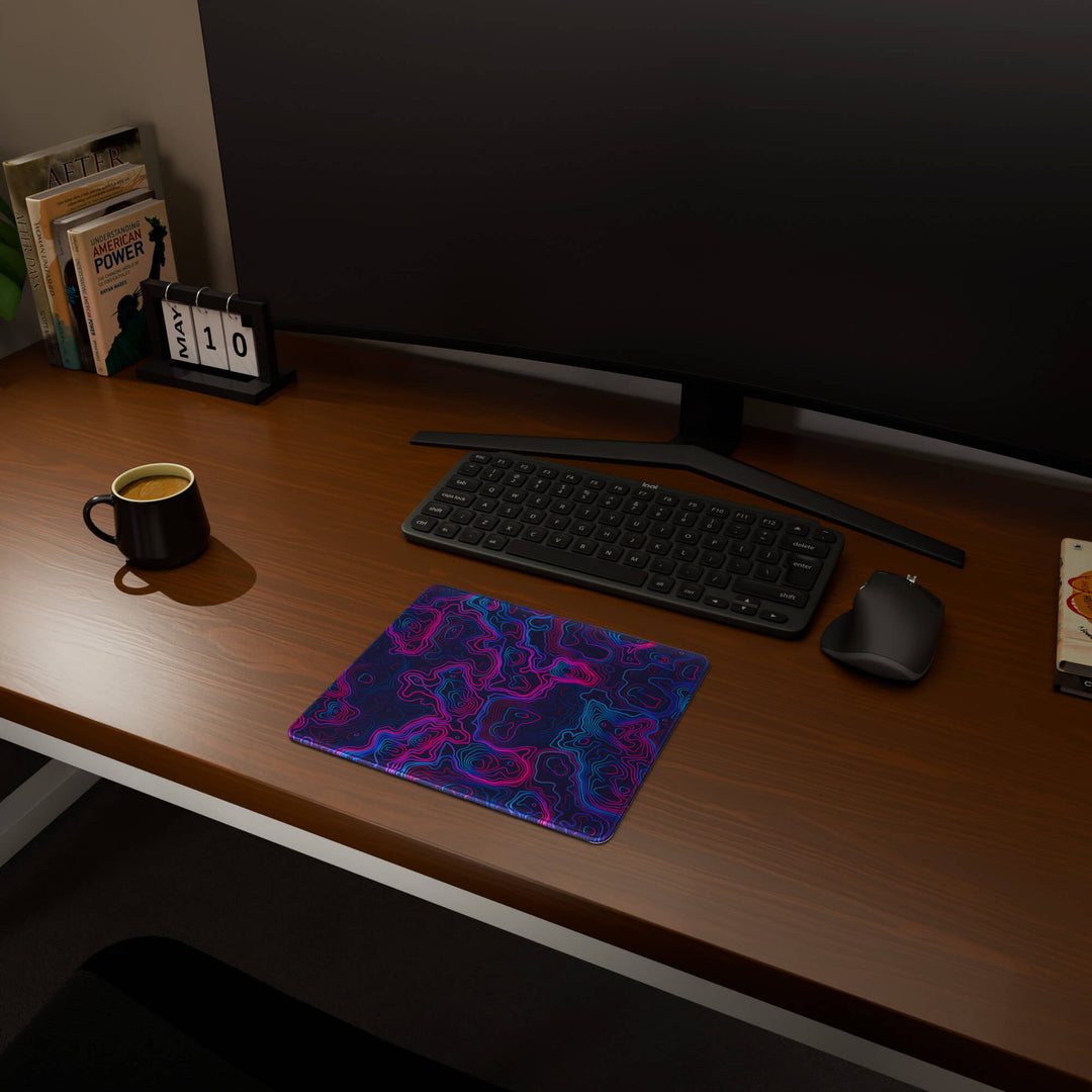 Full desktop view featuring a compact 29x25CM-11.4x9.8in mousepad with 'Vaporwave Topographic' design, inspired by vibrant vaporwave and neon topographic art. This space-saving mousepad offers a comfortable and smooth area for essential mouse movement, ideal for small or minimalist desks.