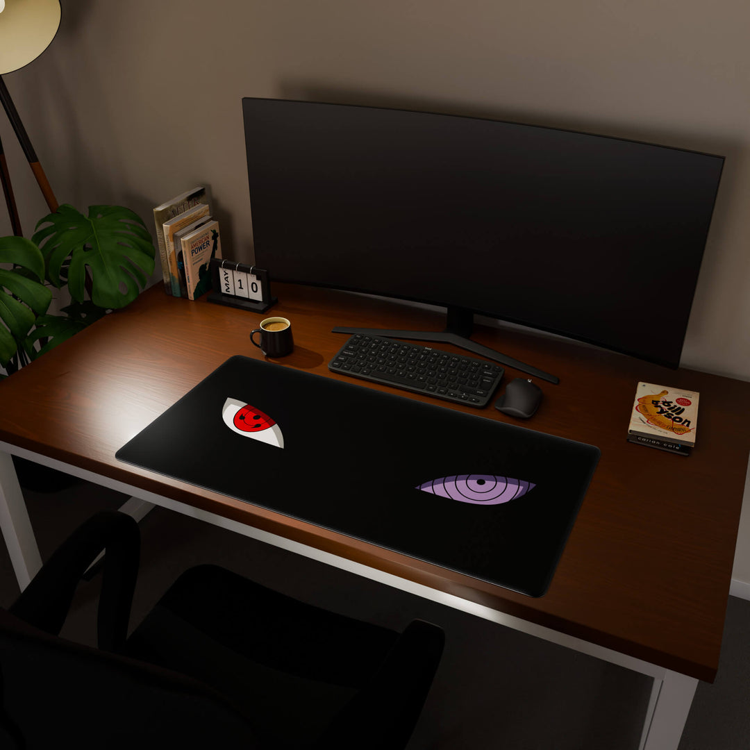 Full desktop view featuring an ultra-wide 100x50CM-39.3x19.6in large mouse pad / desk mat with 'Dōjutsu' design, inspired by minimalist anime ninja eyes. Offering excellent desk protection and space, this oversized mat is ideal for multi-monitor setups or users requiring vast movement freedom.