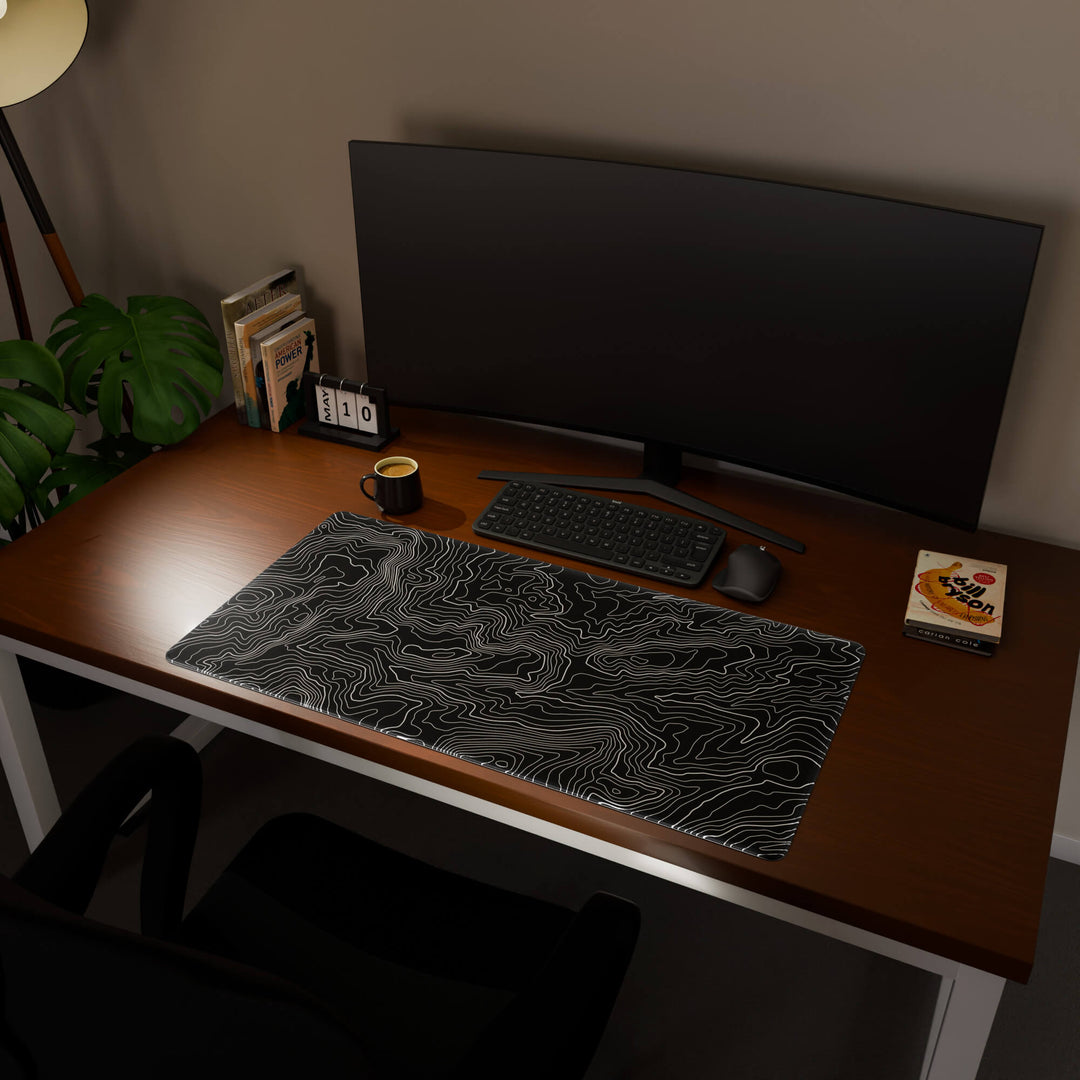 Full desktop view featuring an ultra-wide 100x50CM-39.3x19.6in large mouse pad / desk mat with 'Classic Topographic' design, inspired by minimalist topographic line art. Offering excellent desk protection and space, this oversized mat is ideal for multi-monitor setups or users requiring vast movement freedom.