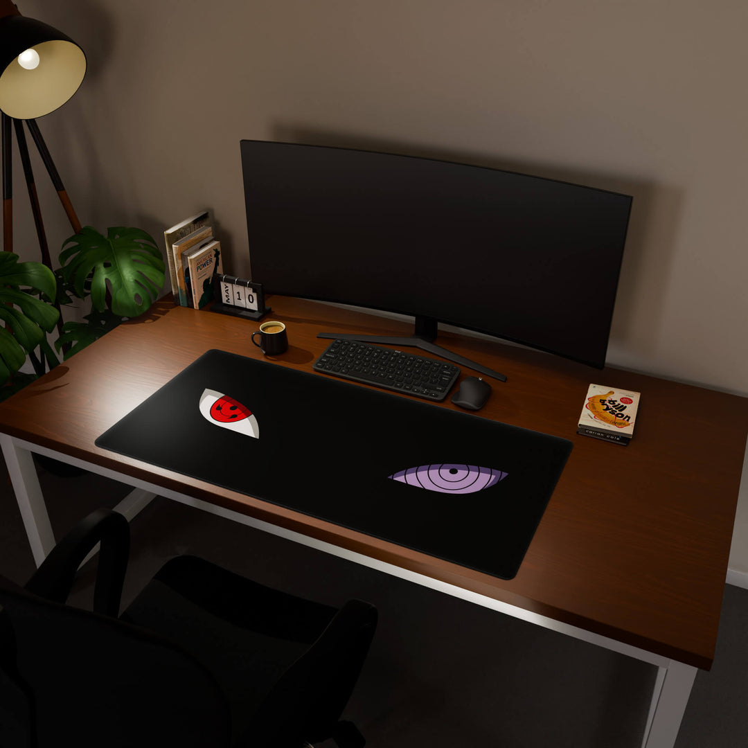 Full desktop view featuring a generously sized 120x57CM-47x22.4in large mouse pad / desk mat with 'Dōjutsu' design, inspired by minimalist anime ninja eyes. Its ample dimensions cater to both demanding gaming and professional tasks, ensuring consistent performance and a neat workspace.