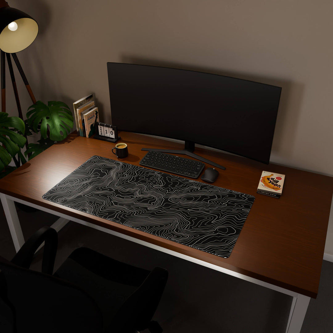 Full desktop view featuring a generously sized 120x57CM-47x22.4in large mouse pad / desk mat with 'Classic Topographic' design, inspired by minimalist topographic line art. Its ample dimensions cater to both demanding gaming and professional tasks, ensuring consistent performance and a neat workspace.