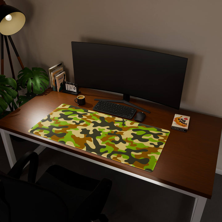 Full desktop view featuring a generously sized 120x57CM-47x22.4in large mouse pad / desk mat with 'Woodland Camo' design, inspired by a classic woodland camouflage pattern. Its ample dimensions cater to both demanding gaming and professional tasks, ensuring consistent performance and a neat workspace.