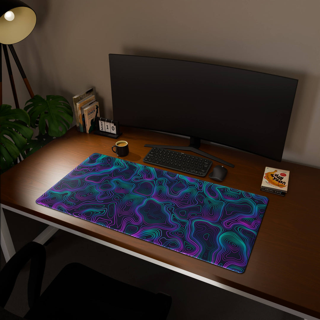 Full desktop view featuring an extra-large 120x60CM-47x23.6in large mouse pad / desk mat with 'Neon Topographic' design, inspired by vibrant neon topographic art. This maximum coverage mat transforms your entire desk surface into a unified, high-performance area, perfect for demanding users and full-desk setups.