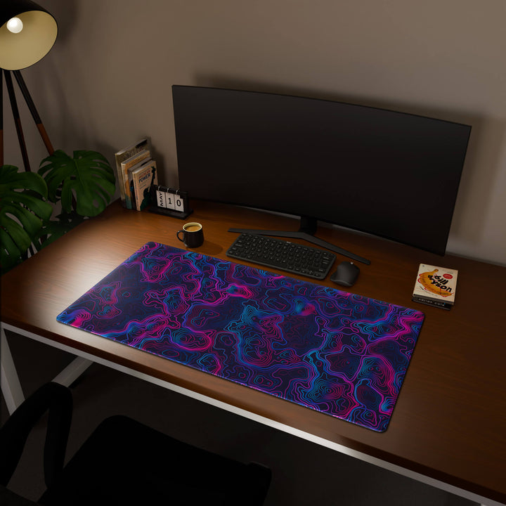 Full desktop view featuring an extra-large 120x60CM-47x23.6in large mouse pad / desk mat with 'Vaporwave Topographic' design, inspired by vibrant vaporwave and neon topographic art. This maximum coverage mat transforms your entire desk surface into a unified, high-performance area, perfect for demanding users and full-desk setups.