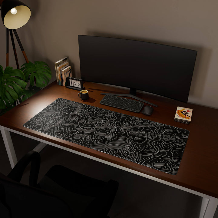 Full desktop view featuring an ultra-wide 140x57CM-55x22.4in large mouse pad / desk mat with 'Classic Topographic' design, inspired by minimalist topographic line art. Its enormous size offers unparalleled desk protection and space, designed for large-scale workstations and immersive gaming.