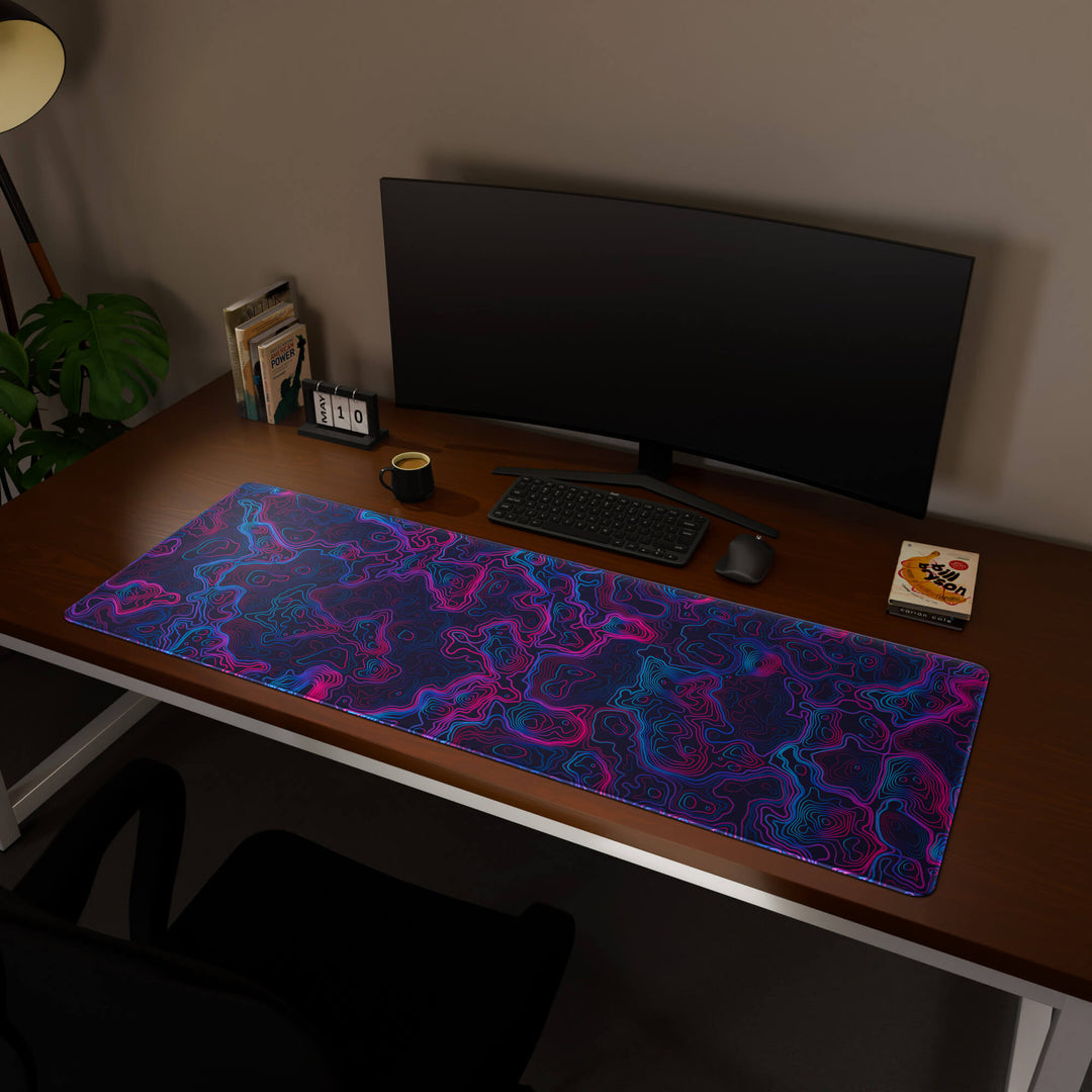 Full desktop view featuring a massive 160x57CM-63x22.4in large mouse pad / desk mat with 'Vaporwave Topographic' design, inspired by vibrant vaporwave and neon topographic art. This premium, full-desk mat provides the ultimate coverage for an entire workstation, protecting the surface and unifying the space.