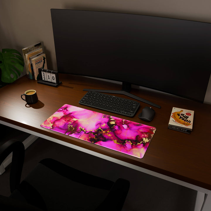 Full desktop view featuring a versatile 70x30CM-27.5x11.8in large mouse pad / desk mat with 'Pink & Gold' design, inspired by pink and gold alcohol ink art. Its balanced dimensions offer sufficient room for efficient navigation, making it a perfect and stylish upgrade for any standard desk.