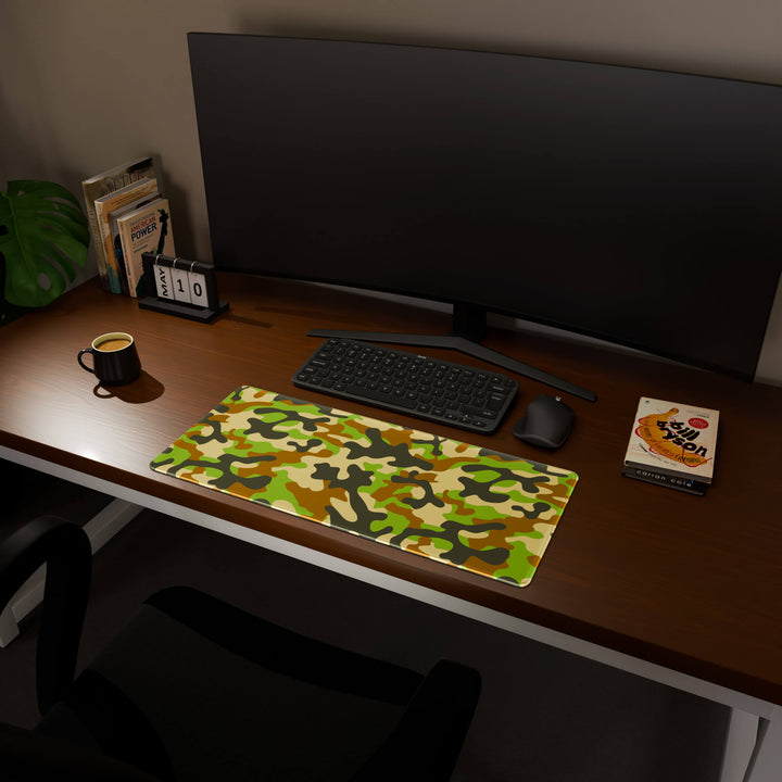 Full desktop view featuring a versatile 70x30CM-27.5x11.8in large mouse pad / desk mat with 'Woodland Camo' design, inspired by a classic woodland camouflage pattern. Its balanced dimensions offer sufficient room for efficient navigation, making it a perfect and stylish upgrade for any standard desk.