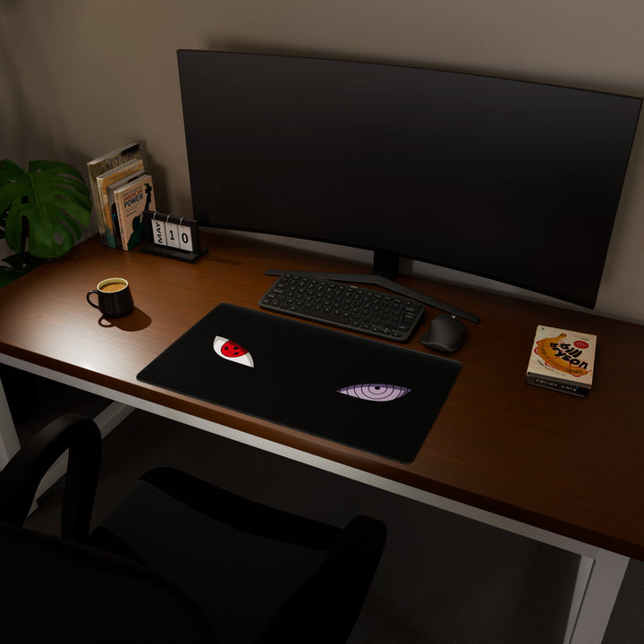 Full desktop view featuring a deep 70x40CM-27.5x15.7in large mouse pad / desk mat with 'Dōjutsu' design, inspired by minimalist anime ninja eyes. The increased depth offers more wrist and arm support, enhancing comfort during prolonged computer use and protecting the desk below.