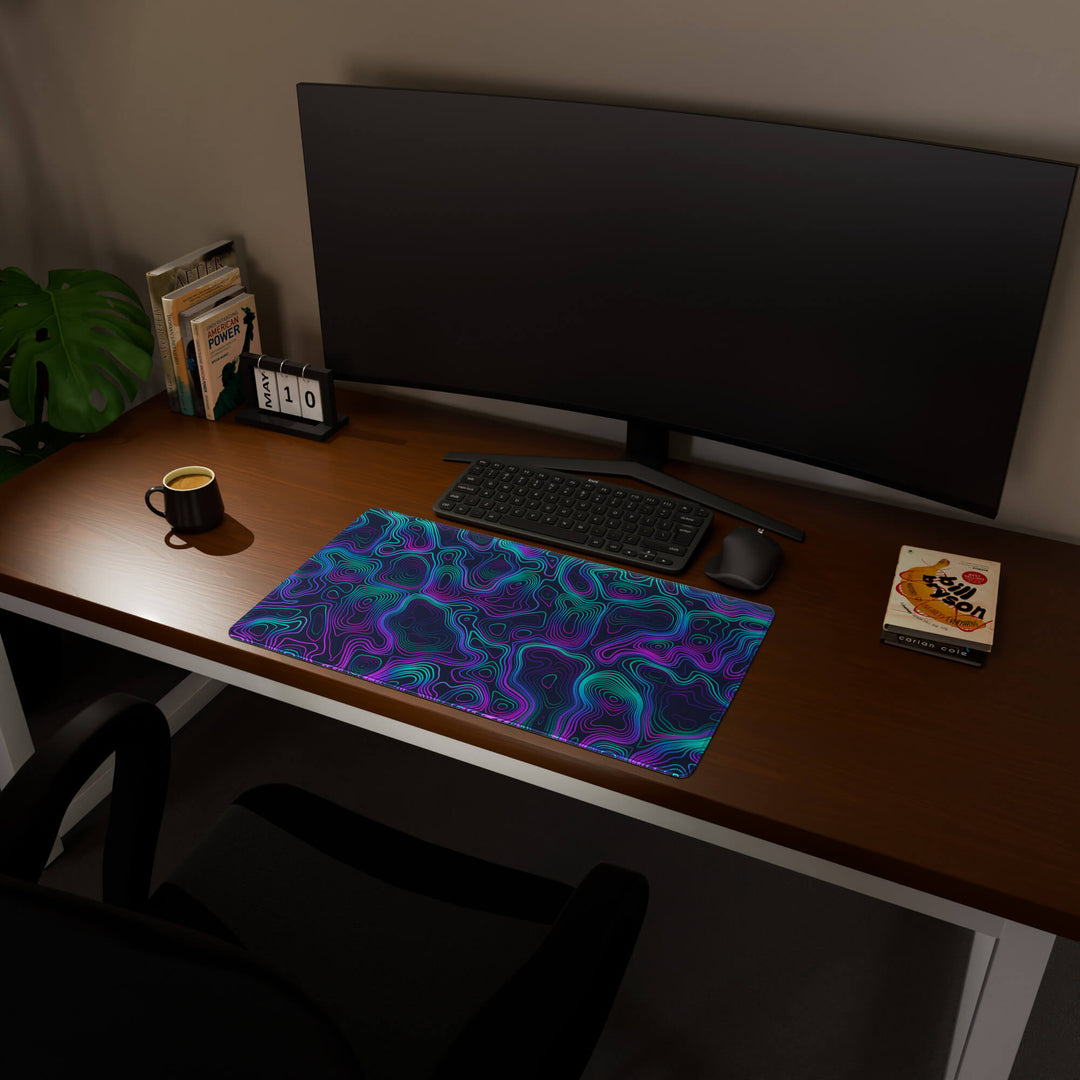 Full desktop view featuring a deep 70x40CM-27.5x15.7in large mouse pad / desk mat with 'Neon Topographic' design, inspired by vibrant neon topographic art. The increased depth offers more wrist and arm support, enhancing comfort during prolonged computer use and protecting the desk below.