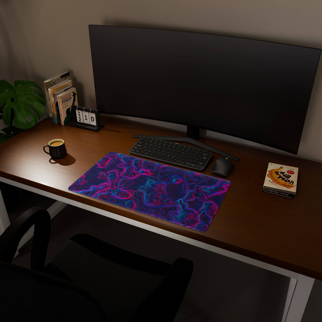 Full desktop view featuring a deep 70x40CM-27.5x15.7in large mouse pad / desk mat with 'Vaporwave Topographic' design, inspired by vibrant vaporwave and neon topographic art. The increased depth offers more wrist and arm support, enhancing comfort during prolonged computer use and protecting the desk below.