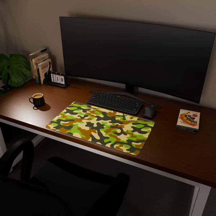 Full desktop view featuring a deep 70x40CM-27.5x15.7in large mouse pad / desk mat with 'Woodland Camo' design, inspired by a classic woodland camouflage pattern. The increased depth offers more wrist and arm support, enhancing comfort during prolonged computer use and protecting the desk below.