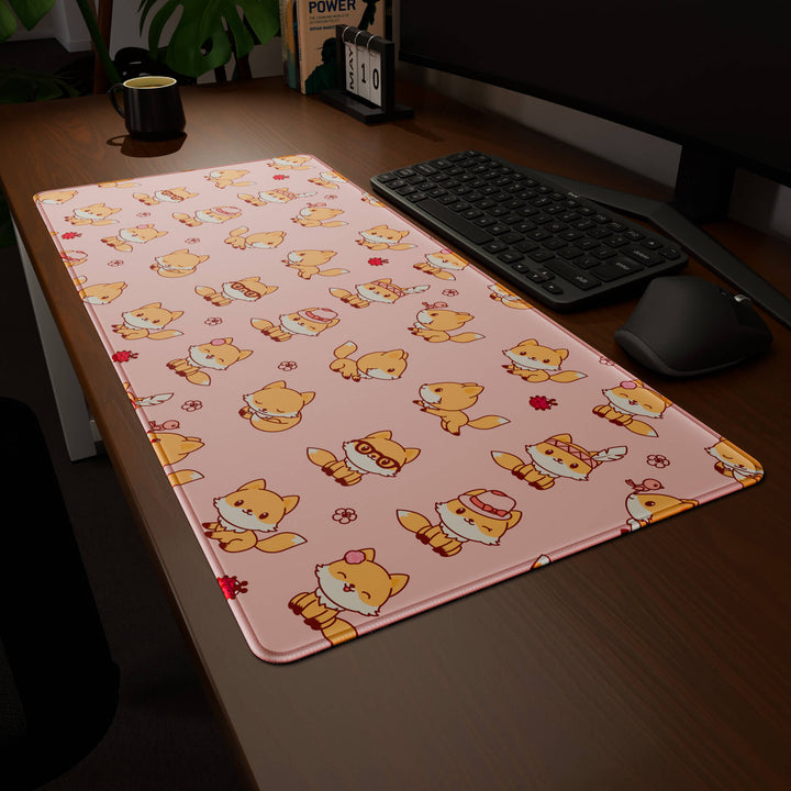 Clean angled presentation of a 90x40CM / 35x15.7in large mouse pad / desk mat showcasing the dramatic 'Kawaii Fox' design, inspired by cute kawaii pink animal art. Its high-quality fabric surface is designed for optical and laser mice, delivering superior tracking performance and responsiveness.