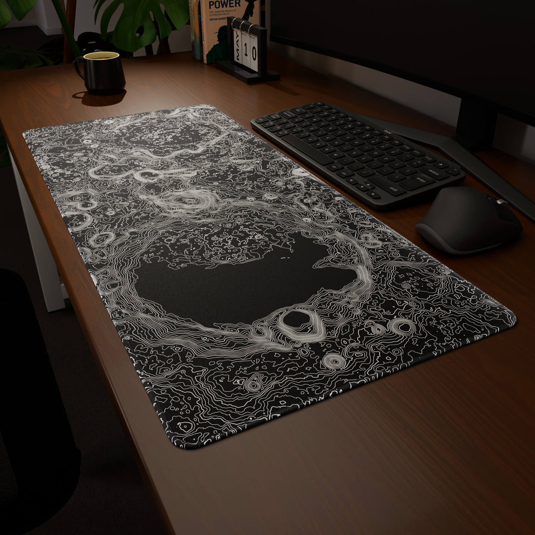 Clean angled presentation of a 90x40CM / 35x15.7in large mouse pad / desk mat showcasing the dramatic 'Lunar Topographic' design, inspired by minimalist lunar surface art. Its high-quality fabric surface is designed for optical and laser mice, delivering superior tracking performance and responsiveness.