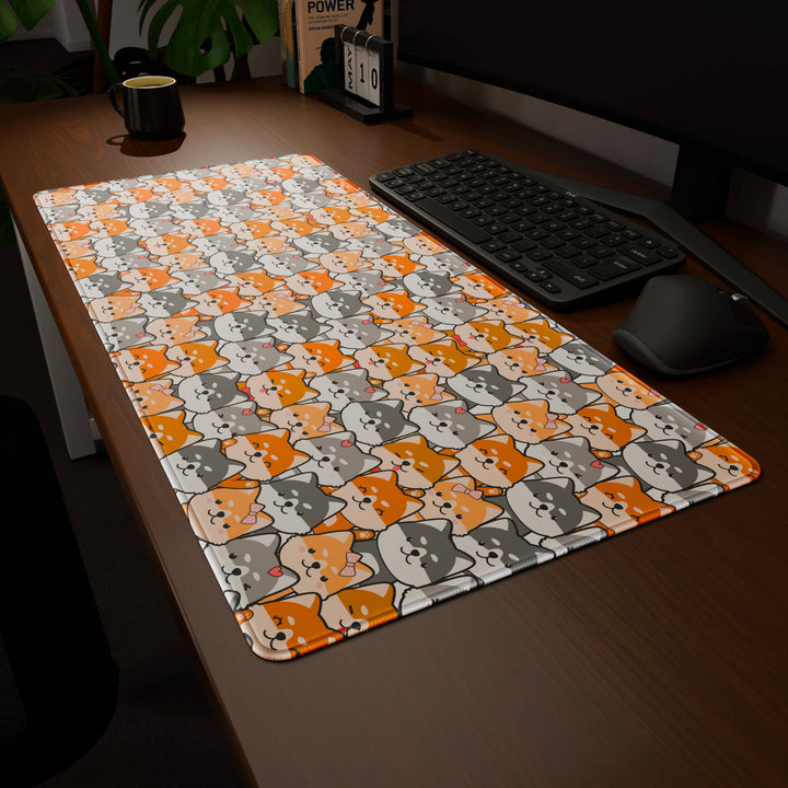 Clean angled presentation of a 90x40CM / 35x15.7in large mouse pad / desk mat showcasing the dramatic 'Miniature Pups' design, inspired by a cute kawaii dog pattern. Its high-quality fabric surface is designed for optical and laser mice, delivering superior tracking performance and responsiveness.