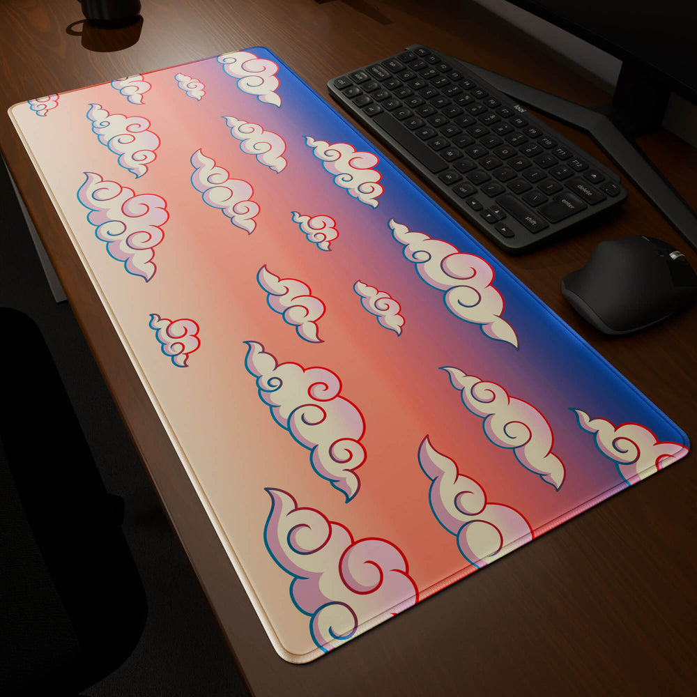 Dynamic angled perspective of a 90x40CM / 35x15.7in large mouse pad / desk mat featuring the vivid 'Sunset Clouds' design, inspired by Naruto and vibrant Japanese anime art. Its generous dimensions offer a vast, smooth area that protects your desk while enhancing mouse glide and overall comfort.