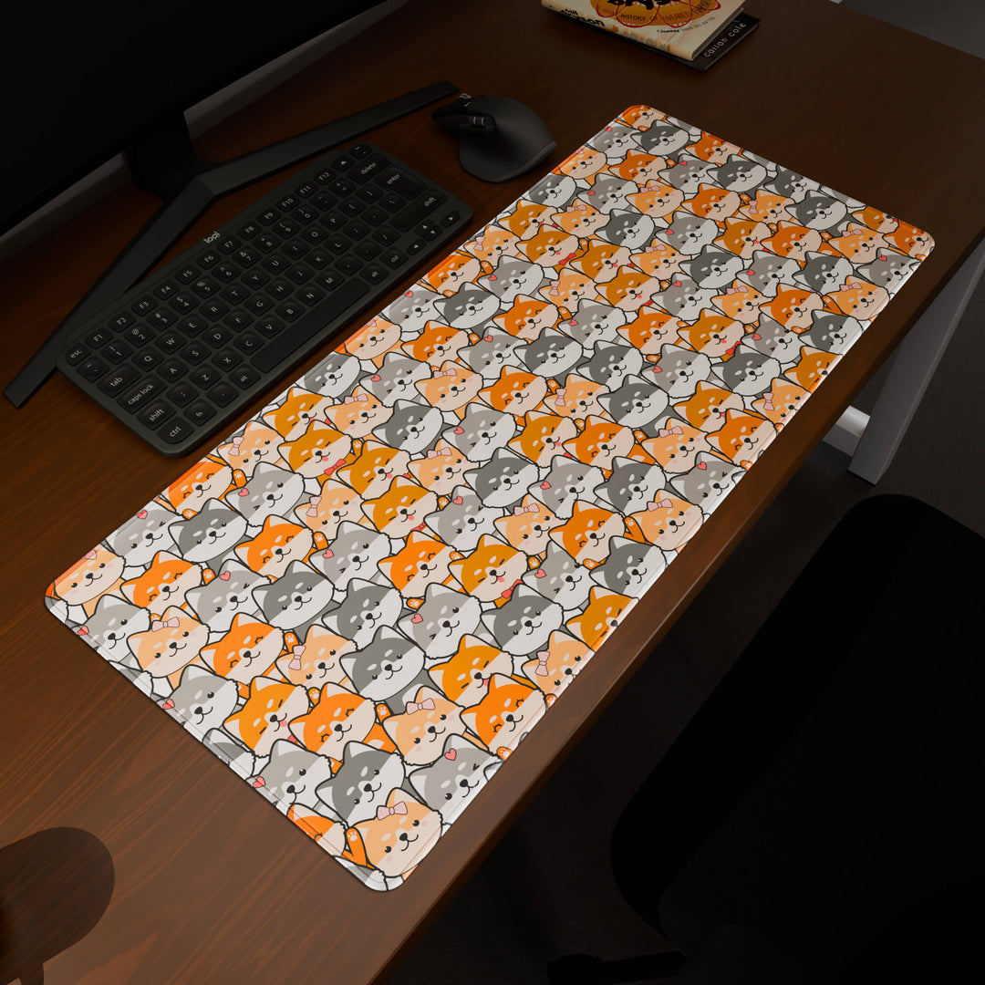 Elevated view of a 90x40CM / 35x15.7in large mouse pad / desk mat prominently displaying the 'Miniature Pups' design, inspired by a cute kawaii dog pattern. This premium mat provides a stable, non-slip surface, crucial for maintaining focus and accuracy during intense gaming or work sessions.