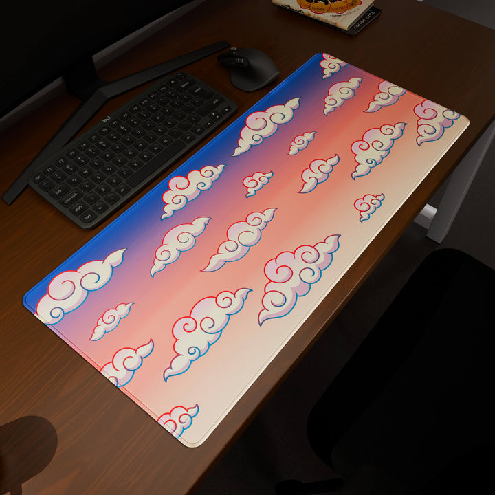 Elevated view of a 90x40CM / 35x15.7in large mouse pad / desk mat prominently displaying the 'Sunset Clouds' design, inspired by Naruto and vibrant Japanese anime art. This premium mat provides a stable, non-slip surface, crucial for maintaining focus and accuracy during intense gaming or work sessions.