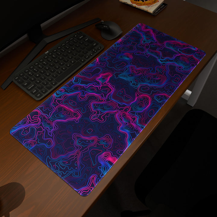 Elevated view of a 90x40CM / 35x15.7in large mouse pad / desk mat prominently displaying the 'Vaporwave Topographic' design, inspired by vibrant vaporwave and neon topographic art. This premium mat provides a stable, non-slip surface, crucial for maintaining focus and accuracy during intense gaming or work sessions.