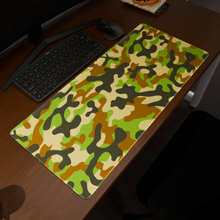 Elevated view of a 90x40CM / 35x15.7in large mouse pad / desk mat prominently displaying the 'Woodland Camo' design, inspired by a classic woodland camouflage pattern. This premium mat provides a stable, non-slip surface, crucial for maintaining focus and accuracy during intense gaming or work sessions.