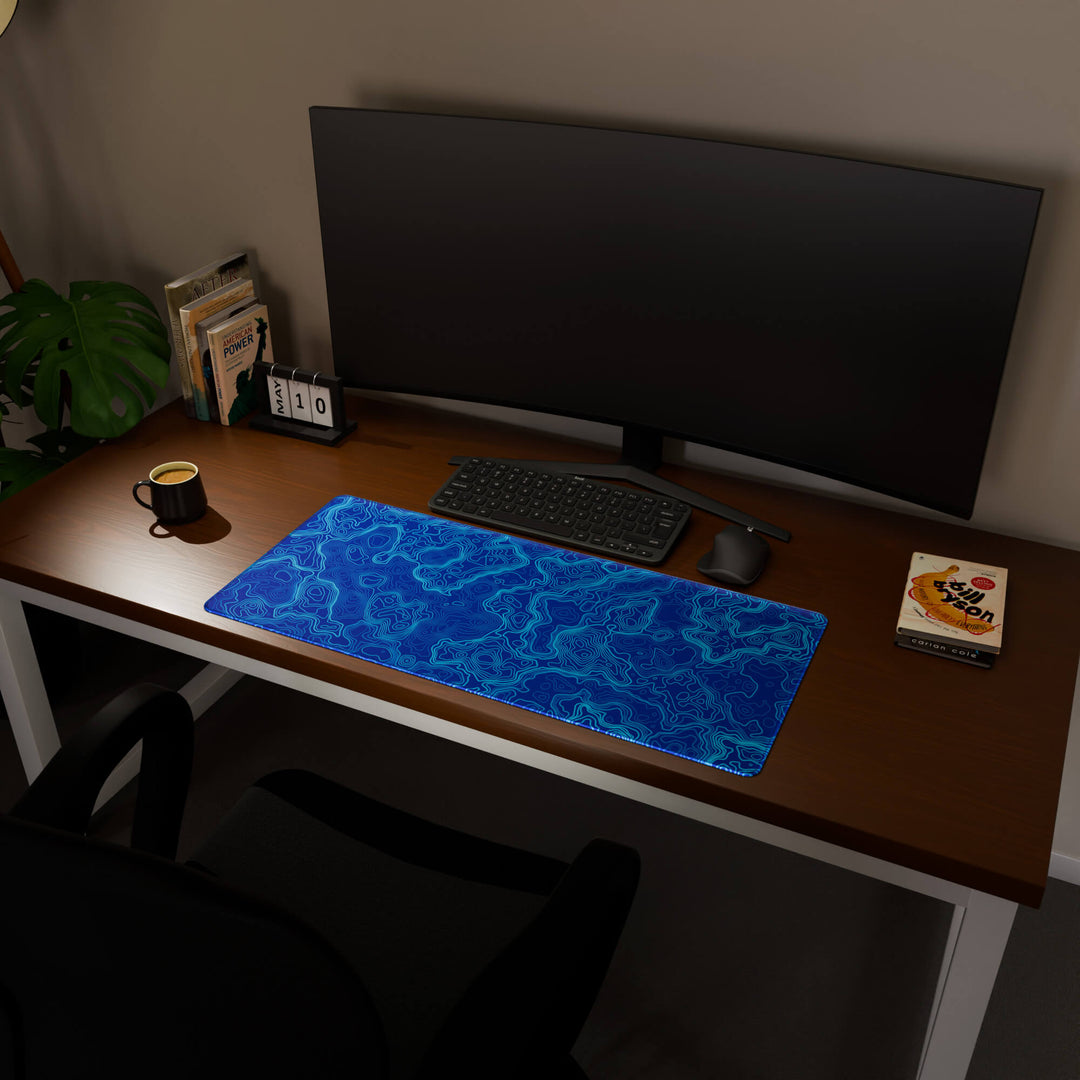 Full desktop view featuring a spacious 90x40CM / 35x15.7in large mouse pad / desk mat with 'Blue Topographic' design, inspired by blue minimalist topographic art. This popular large mat is designed for comprehensive desk coverage, providing an expansive and protective base for all your peripherals.