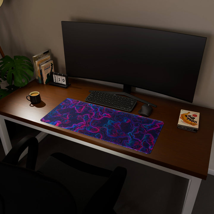 Full desktop view featuring a spacious 90x40CM / 35x15.7in large mouse pad / desk mat with 'Vaporwave Topographic' design, inspired by vibrant vaporwave and neon topographic art. This popular large mat is designed for comprehensive desk coverage, providing an expansive and protective base for all your peripherals.