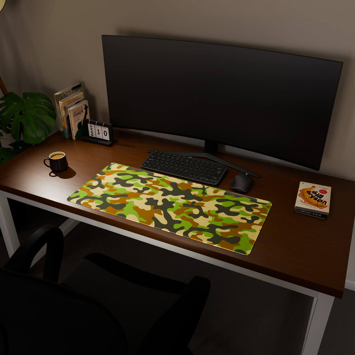 Full desktop view featuring a spacious 90x40CM / 35x15.7in large mouse pad / desk mat with 'Woodland Camo' design, inspired by a classic woodland camouflage pattern. This popular large mat is designed for comprehensive desk coverage, providing an expansive and protective base for all your peripherals.