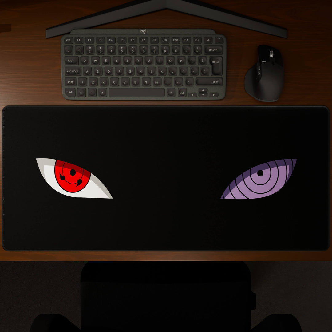 Top-down view of a 90x40CM / 35x15.7in large mouse pad / desk mat showcasing the full 'Dōjutsu' design, inspired by minimalist anime ninja eyes. The large surface provides ample space for keyboard and mouse, ensuring precise control and comfortable use for both gaming and office tasks.