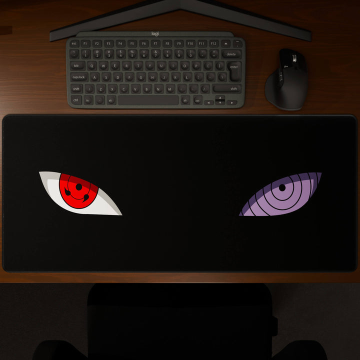 Top-down view of a 90x40CM / 35x15.7in large mouse pad / desk mat showcasing the full 'Dōjutsu' design, inspired by minimalist anime ninja eyes. The large surface provides ample space for keyboard and mouse, ensuring precise control and comfortable use for both gaming and office tasks.