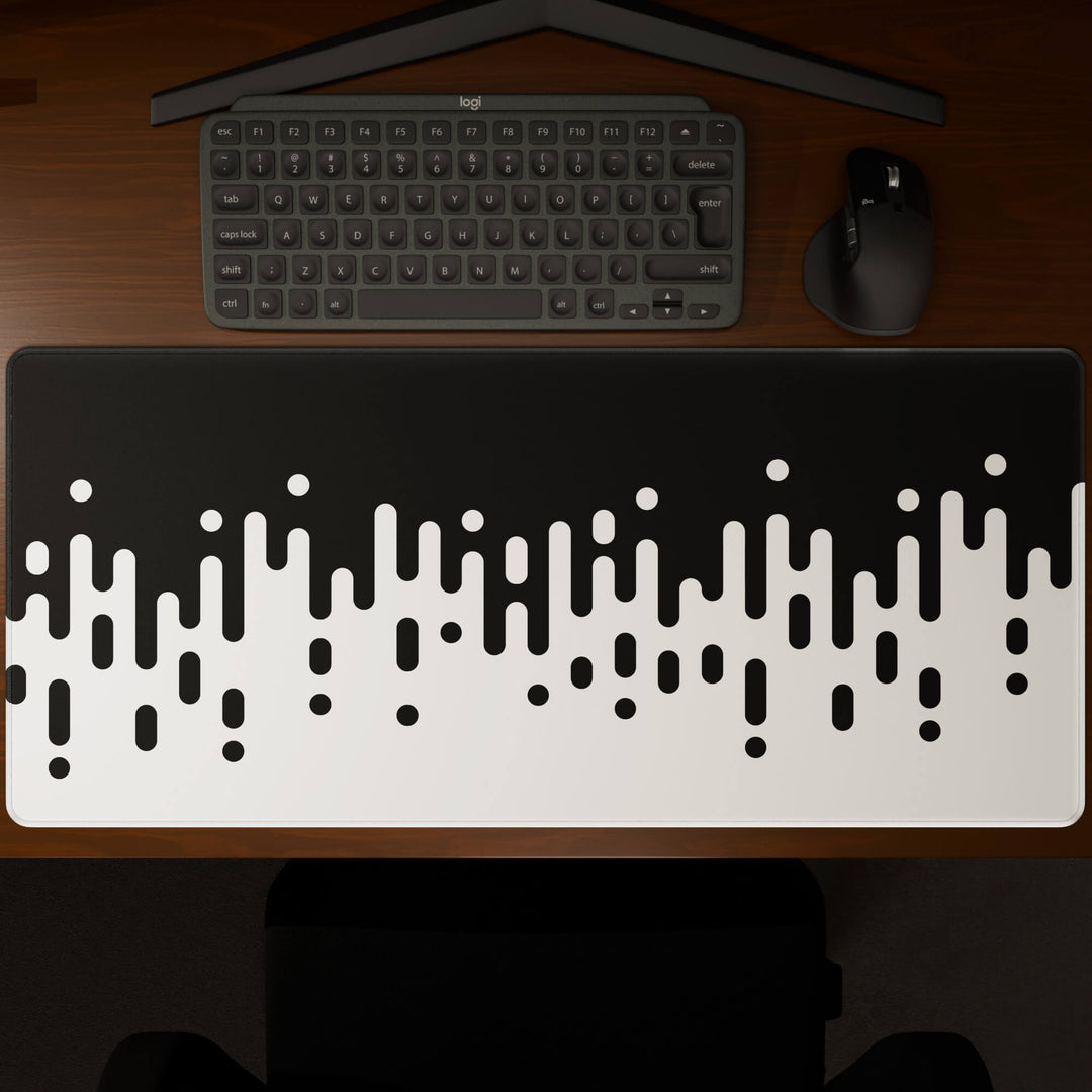 Top-down view of a 90x40CM / 35x15.7in large mouse pad / desk mat showcasing the full 'Monochrome Drip' design, inspired by black and white minimalist art. The large surface provides ample space for keyboard and mouse, ensuring precise control and comfortable use for both gaming and office tasks.