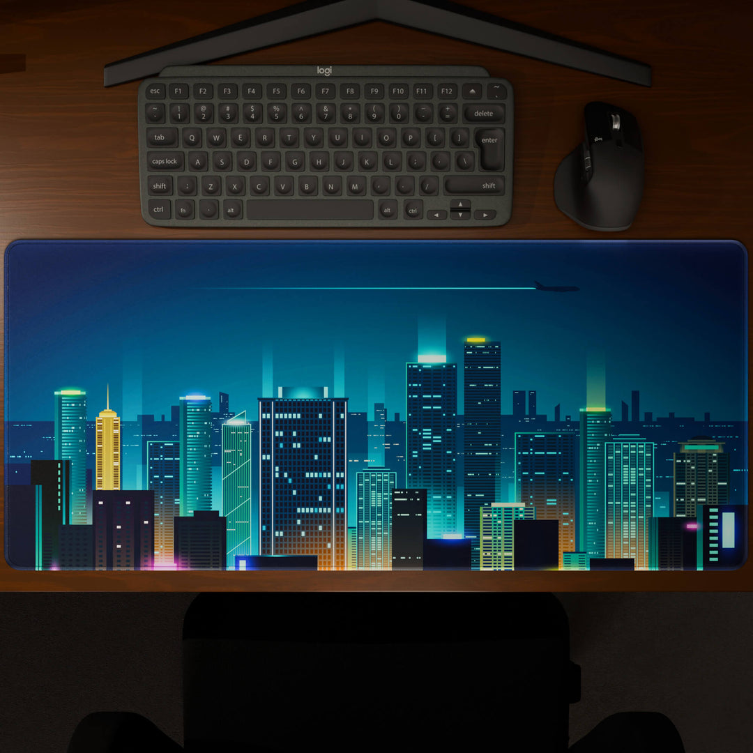 Top-down view of a 90x40CM / 35x15.7in large mouse pad / desk mat showcasing the full 'Neon City' design, inspired by cyberpunk cityscape art. The large surface provides ample space for keyboard and mouse, ensuring precise control and comfortable use for both gaming and office tasks.