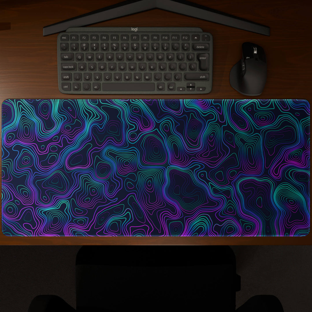 Top-down view of a 90x40CM / 35x15.7in large mouse pad / desk mat showcasing the full 'Neon Topographic' design, inspired by vibrant neon topographic art. The large surface provides ample space for keyboard and mouse, ensuring precise control and comfortable use for both gaming and office tasks.