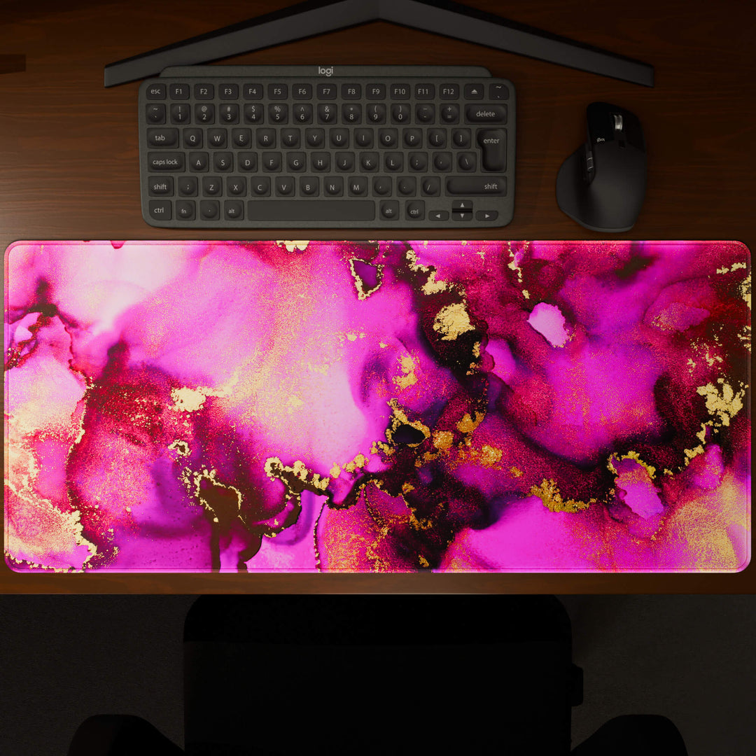 Top-down view of a 90x40CM / 35x15.7in large mouse pad / desk mat showcasing the full 'Pink & Gold' design, inspired by pink and gold alcohol ink art. The large surface provides ample space for keyboard and mouse, ensuring precise control and comfortable use for both gaming and office tasks.