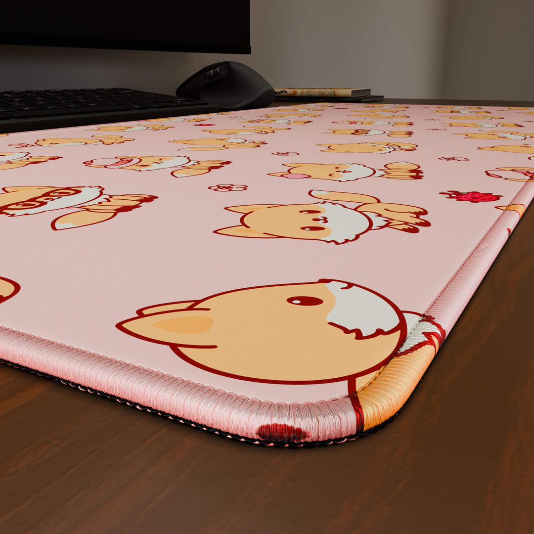 Close-up angled shot highlighting the durable stitched edges of a 90x40CM / 35x15.7in large mouse pad / desk mat with the 'Kawaii Fox' design, inspired by cute kawaii pink animal art. The reinforced stitching prevents fraying, ensuring long-lasting durability and a consistently clean aesthetic.
