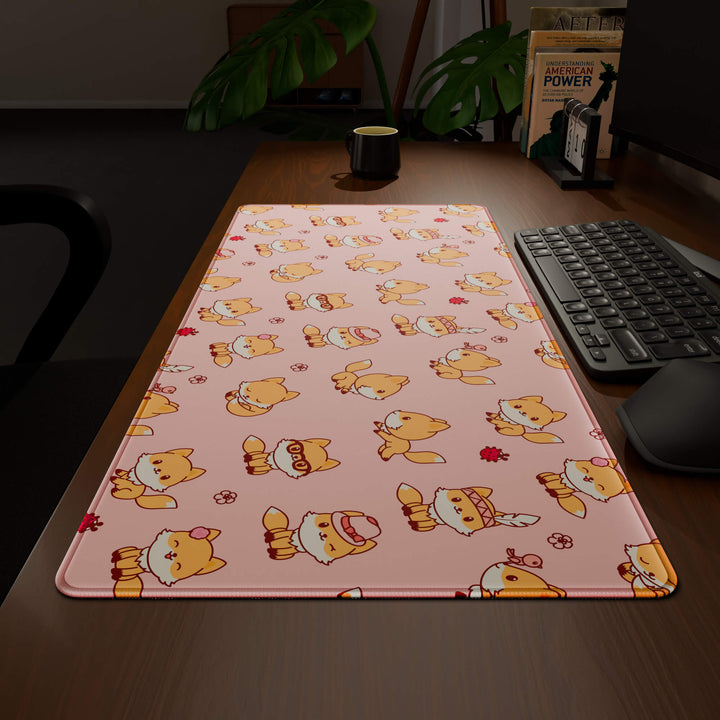 Wide angled view of a complete desk setup, featuring a 90x40CM / 35x15.7in large mouse pad / desk mat with the captivating 'Kawaii Fox' design, inspired by cute kawaii pink animal art. This extra-large mousepad seamlessly integrates into any workspace, providing a cohesive and productive environment.