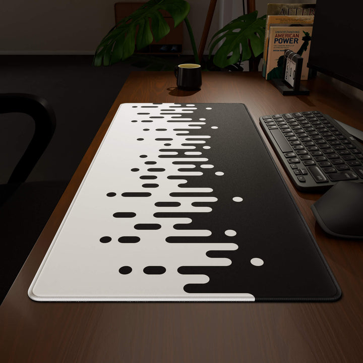 Wide angled view of a complete desk setup, featuring a 90x40CM / 35x15.7in large mouse pad / desk mat with the captivating 'Monochrome Drip' design, inspired by black and white minimalist art. This extra-large mousepad seamlessly integrates into any workspace, providing a cohesive and productive environment.