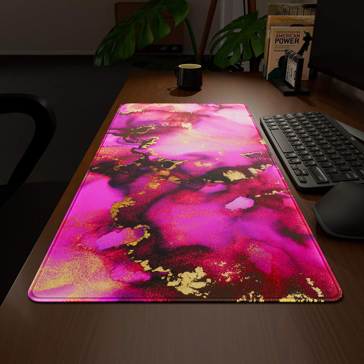 Wide angled view of a complete desk setup, featuring a 90x40CM / 35x15.7in large mouse pad / desk mat with the captivating 'Pink & Gold' design, inspired by pink and gold alcohol ink art. This extra-large mousepad seamlessly integrates into any workspace, providing a cohesive and productive environment.